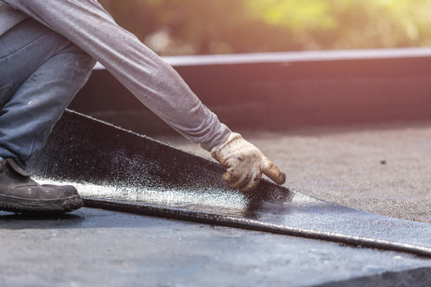 Professional Emergency Waterproofing technician working in Henryville, IN